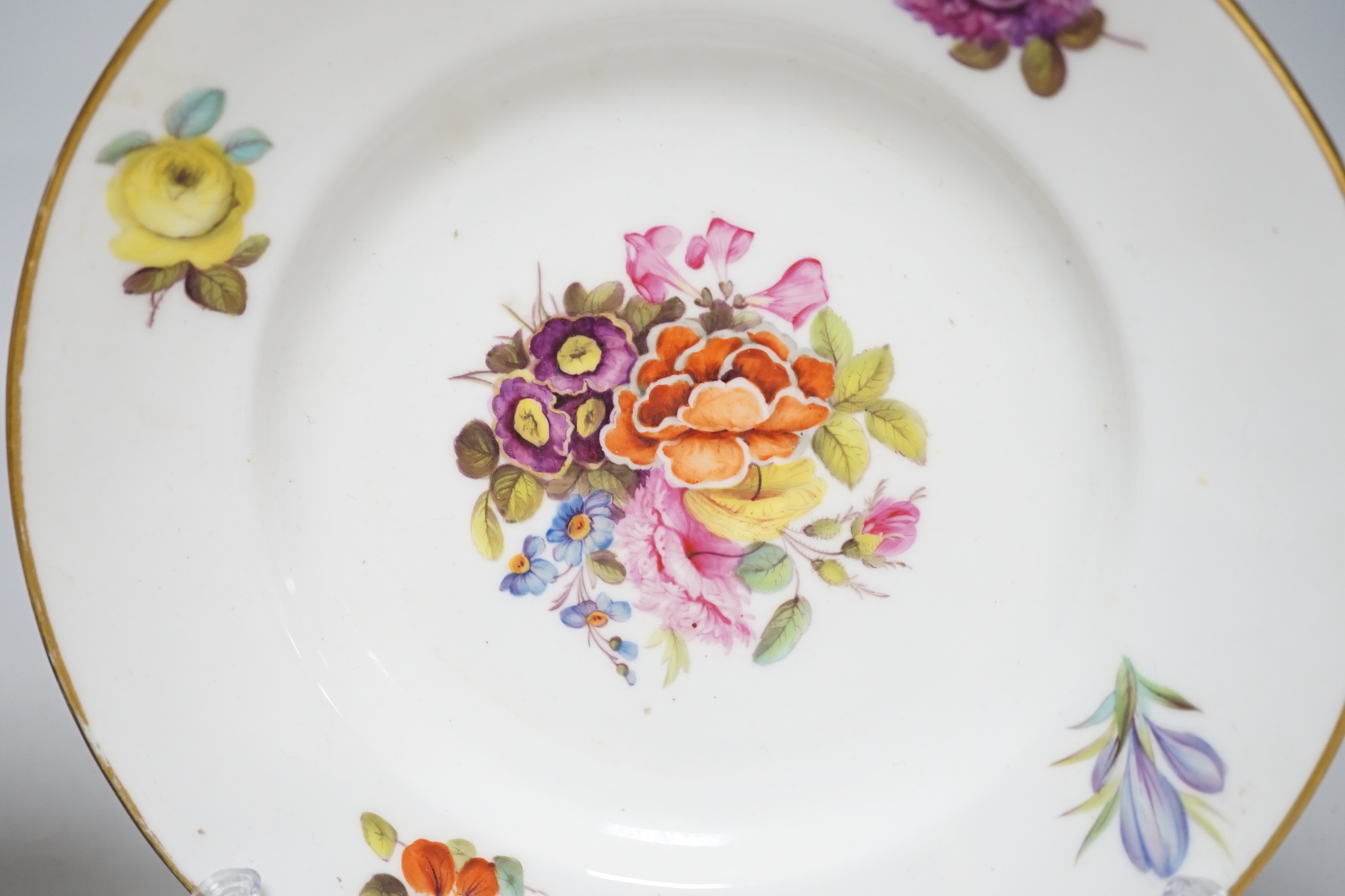 A pair of 19th century Derby floral small plates with gilded decoration, probably painted by Webster, c.1820, each 17cm in diameter